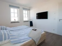 Apartment beach life. 2 bedrooms, high quality furnishings, great sea views! Hotels in Borgerende-Rethwisch