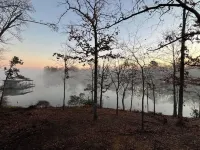 Modern lakefront cabin nestled in the piney woods of East Texas. Pet Friendly!