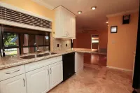 Fun Magical Home on Canal-Relaxing Pool -Spa-Enjoy Fishing-Kayaks-WiFi-Near All