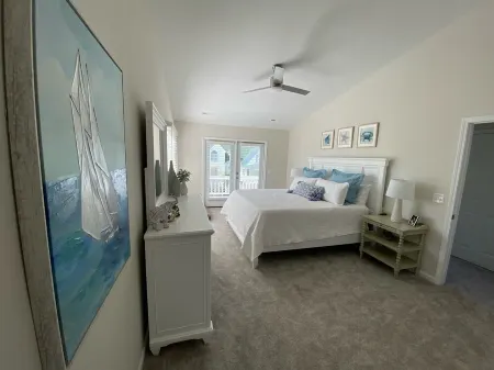 FULLY RENOVATED: pool, walk to beach, water views!