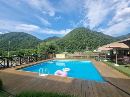 Danyang Flowers Pension Отели рядом с достопримечательностью «Guinsa Temple»