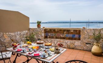 Palazzo Giunta - Porta Marina Ortigia