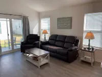 Spacious Kitchen and Cozy Patio - Charming Modern Getaway