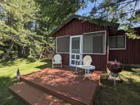Dock and Fire Pit with Sandy Bottom - Cozy Log Cabin Retreat