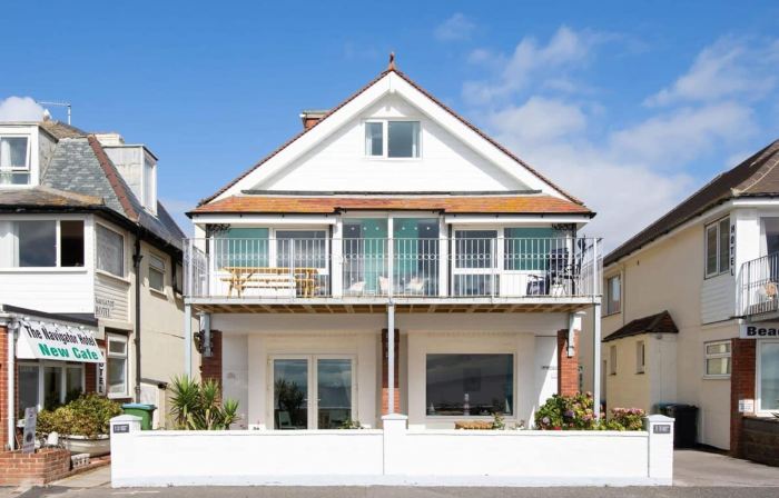 Absolute Beachfront with Decked Garden Oasis and Views