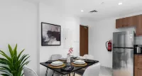 Executive 1 Br in Oasis - 2 Hotels in Khalifa City