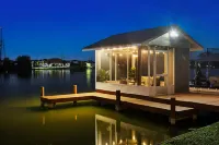 Luxe Waterfront Hideaway w Pool & Pirate Ship Dock