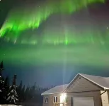 Aurora viewing 3BR/2BA home, plus heated 2 car garage, North Pole, AK.