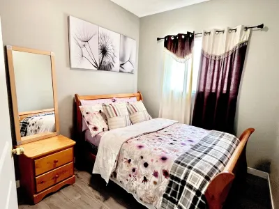 Spacious main floor suite in detached bungalow w/ Garage & Kitchen Hotels near Canadian Tire