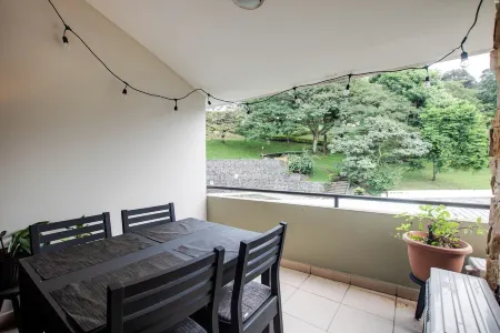 Chic 2-bedroom apartment with WiFi, balcony with mountain views pool in Río Oro