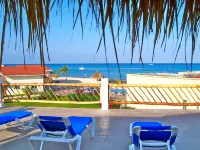 Luxurious Beachfront Retreat in Cozumel - Your Ultimate 4 Bdrm vacation haven!