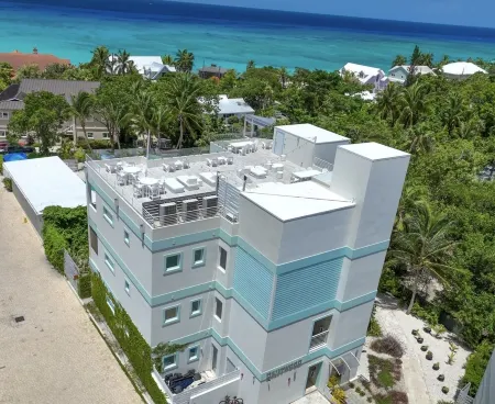 7 Mile Beach private Beach Club, ocean views from Roof deck and Pool Pavilion