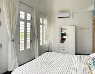 Private condo, water views, great breezes, well appointed for divers