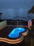 Ocean front home with 3 suites, salt water pool, gated and Wifi.