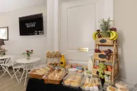 Brinton Suites - Desayuno