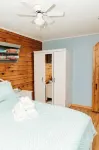 Escape to Tranquility at The Sandy Pearl: A Cozy Log Cottage Retreat