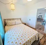Cute downtown Hagerman cottage with stock tank pool & putting green.