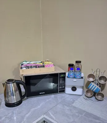 Cozy 3-bedroom townhome in enjoyable Piarco with AC, WiFi Hotels in 