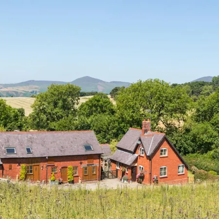 Woodpecker Cottage Отели в г. Лланголлен
