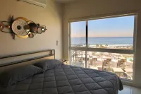 3BR Oceanview retreat with AC, Sleep 8, Gated, Top floor, Pool, Security 24/7