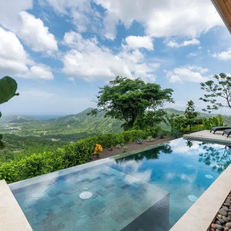 Mountainside Home with Modern Design Sweeping Ocean Views & Private Swimming Pool