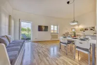 Centrally located apartment with garage & small outdoor area