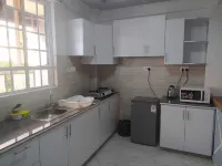 It's an apartment with necessary amenities including a gym