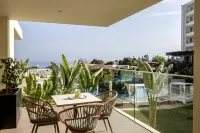 Capo Bay Hotel - Bergblick