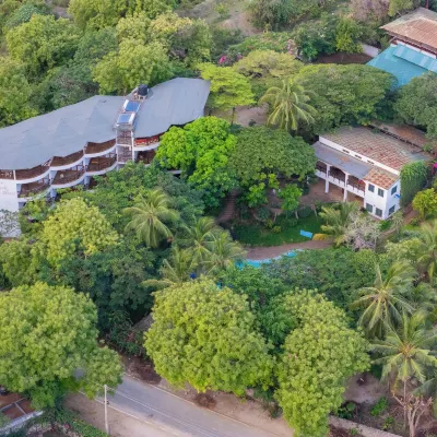 Silver Rock Hotel & Beachfront Apartments Hotels near New Life Prayer Center Church