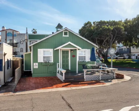 Across quiet street from sandy beach. Hotels in Sunset Beach