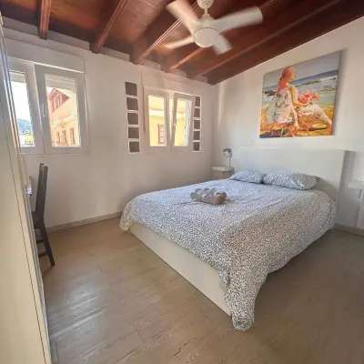 Puerto Nest Hostel Hotels near Playa Jardin