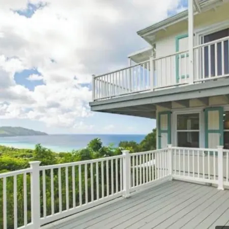 Quiet hillside villa with expansive sea, beach, and mountain views...