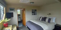 Hokitika Sunset Lodge - Dormitorio King Studio-Master