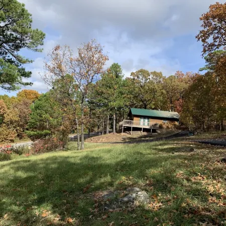 Cabin at Runestone Hideaway just steps from Heavener Runestone Park.