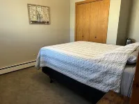 Spacious 5-bedroom house with dock access in welcoming Spirit Lake
