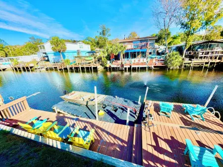 Charming 2/2 waterfront farm home with tons of TV stations, WiFi, dock, & more