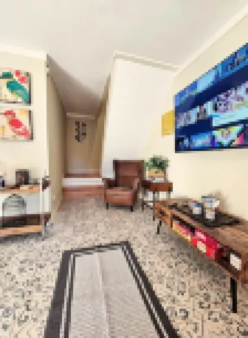 Secluded Two-Story Country Style Loft with Balcony & Free Parking in The Heights