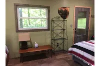 Secluded treehouse with indoor fireplace