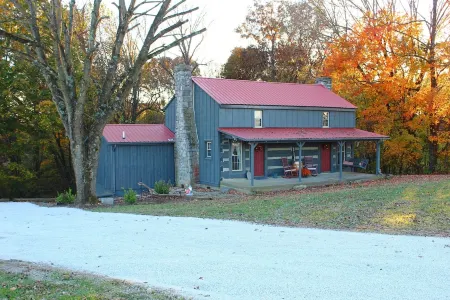 Rustic Retreat, a pre Civil War log cabin.
