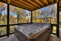 Modern 4BR Cabin w easy access, hot tub & a view!