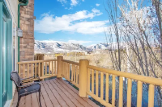 Two level condo with gourmet kitchen, upstairs remodel, and outdoor wonderland.