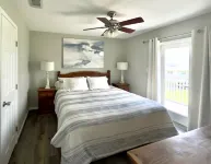 At Coastal Casa enjoy the waves, the breeze, and a quick walk to the sand.