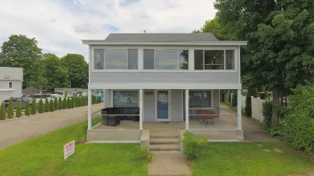 The Inn at Highland Lake, 1st Floor, waterfront yard with a boat dock