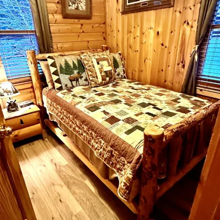 Relax in a cozy and private lake front cabin with breathtaking views!