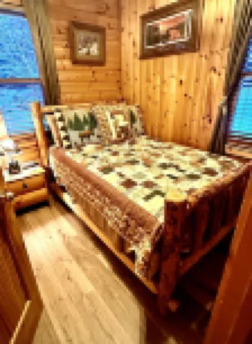 Relax in a cozy and private lake front cabin with breathtaking views!