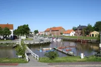near the dyke (30m) and green beach, sea water swimming pool - Wifi