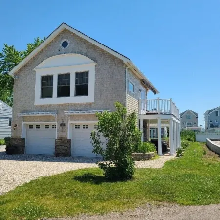 Beach House steps to private beaches in sought after location!