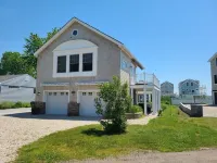 Beach House steps to private beaches in sought after location!