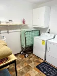 Cozy 4-Bedroom House in Man w WiFi, Arcade Game, and Extra Parking. Near Trails.