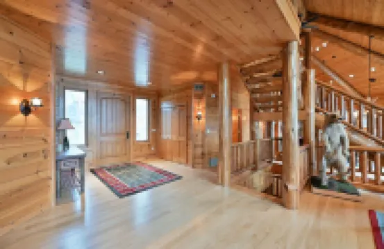Custom-Built Log Cabin Family Friendly Home on Round Lake, Close to Trails!